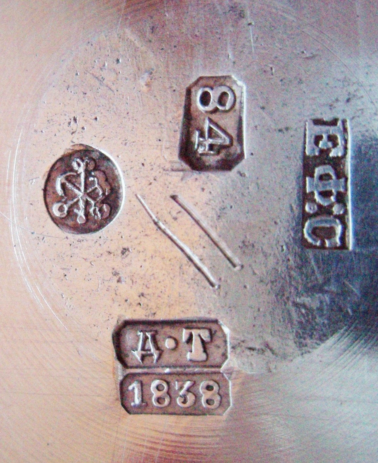 When you want to invest in the best antiques and collectibles it is a fact that pieces stamped with a designer or a manufacturer's mark are usually worth more than the exact same piece bearing no signature. Some marks and stamps are very small, and may require a jeweller’s loupe, or a magnifying glass to make out clearly.