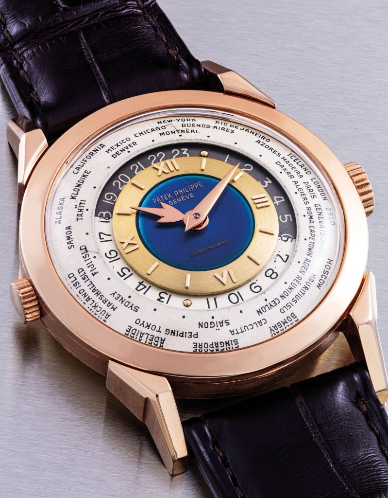 PATEK PHILIPPE_ AN EXCEPTIONAL, UNIQUE AND HIGHLY IMPORTANT 18K PINK GOLD TWO-CROWN WORLD TIME WRISTWATCH WITH 24 HOUR INDICATION AND DOUBLE-SIGNED BLUE ENAMEL DIAL